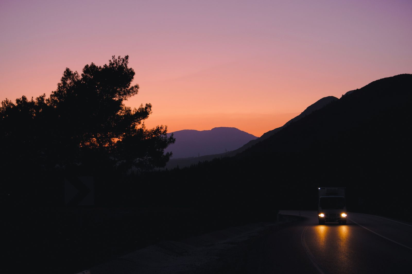 Truck on a highway at dusk